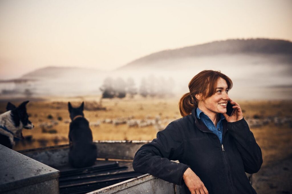 Livestock agent using the Agora app at the yards